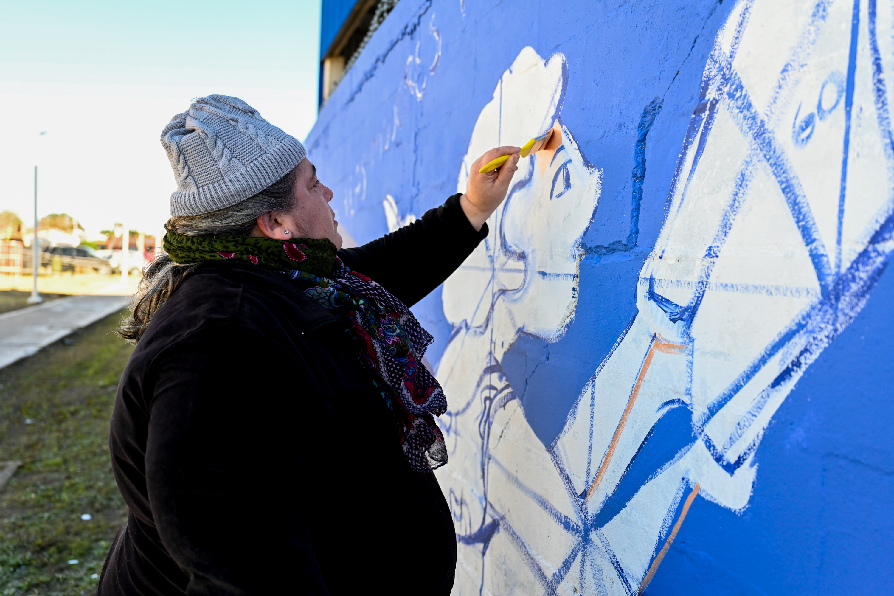 Pintada de mural por campaña «Informando a las mujeres, transformando vidas»