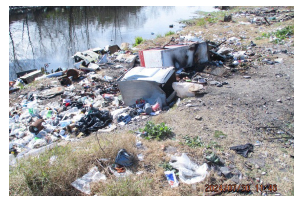 Remoción de tierra en Costanera del Arroyo Carrasco