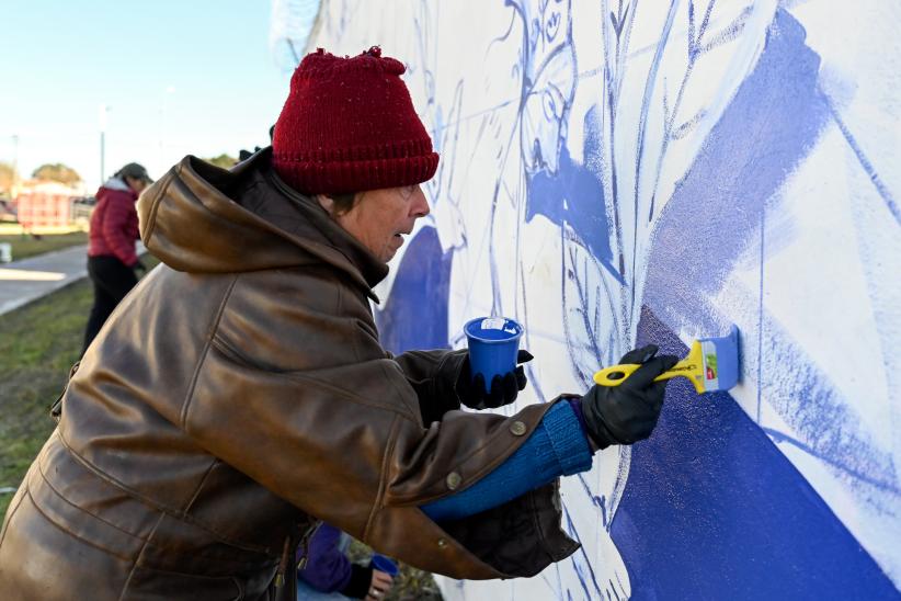 Pintada de mural por campaña «Informando a las mujeres, transformando vidas»