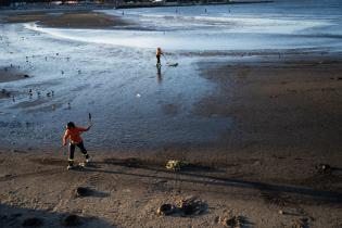 Operativo de limpieza en la playa Ramírez por celebración de I