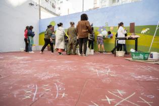 Pintada de mural en Centro Rumbos