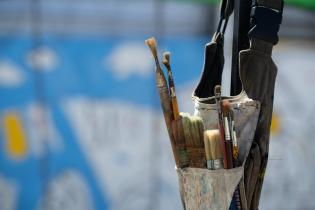 Pintada de mural en Casavalle por usuarios de El Achique Casaval