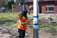 Vecinos y vecinas realizan pintada de columna en el barrio Bajo Valencia